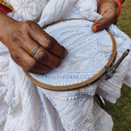A finished hand-embroidered Chikankari panel in a hoop